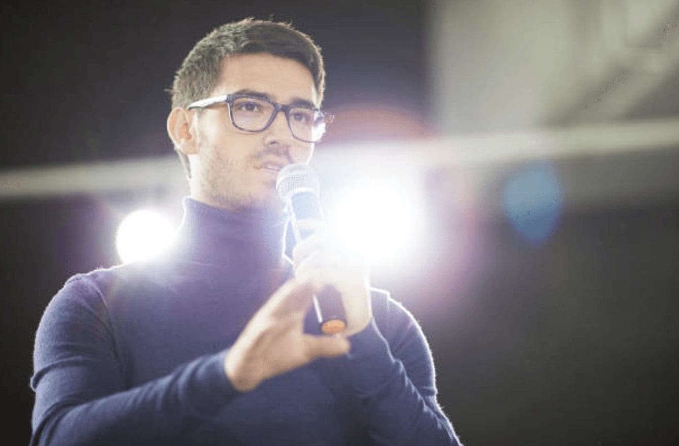 Public Speaking Secret Man demonstrates confidence and public speaking skills.